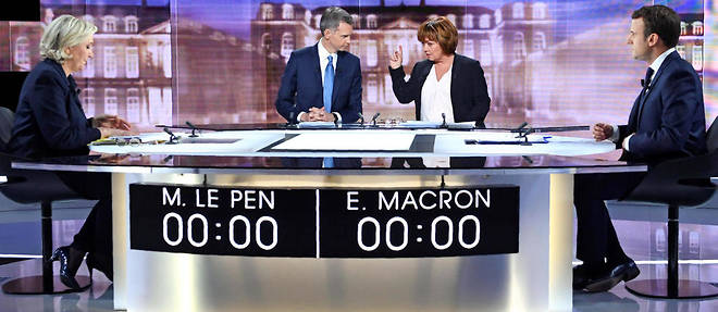 Marine Le Pen et Emmanuel Macron se livrent a un debat plus que muscle.