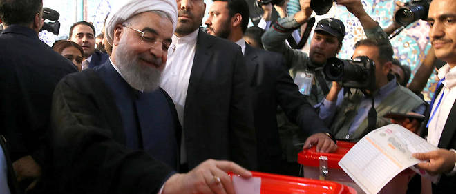 Le president iranien sortant est en passe de remporter l'election des le premier tour, avec 56 % des voix selon les resultats partiels.
