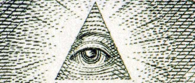 Detail d'un billet de un dollar. Plusieurs theories du complot affirment que la presence, sur les motifs qui l'ornent, d'un oeil a l'interieur d'une pyramide temoigne de l'emprise des illuminati sur le gouvernement americain.