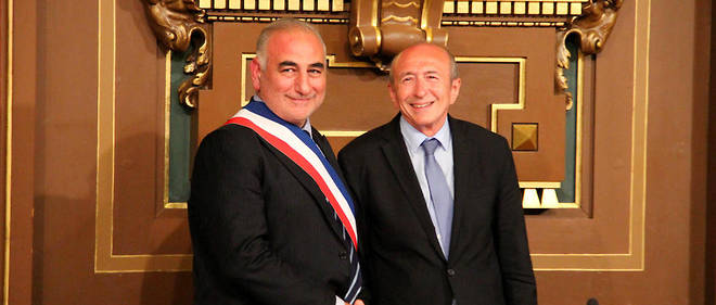 Georges Kepenekian, nouveau maire de Lyon, aux cotes du ministre de l'Interieur Gerard Collomb.