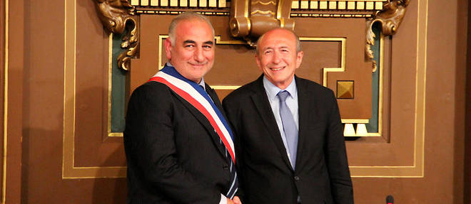 Georges Kepenekian, nouveau maire de Lyon, aux cotes du ministre de l'Interieur Gerard Collomb.