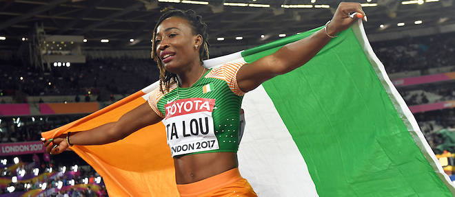 Marie-Josee Ta Lou celebre sa 2e place sur 100 metres dames aux Championnats du monde de Londres le 6 aout 2017.  