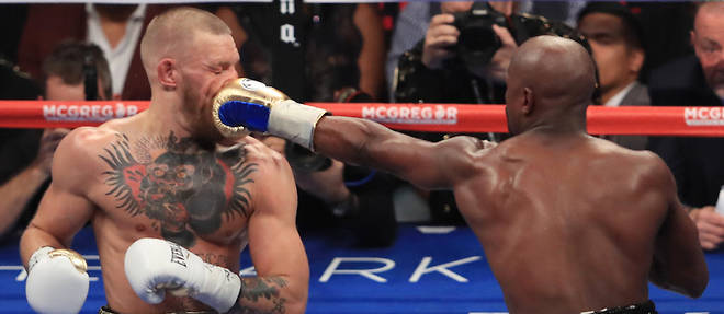 A l'issue de dix rounds, le boxeur Floyd Mayweather est parvenu a s'imposer face a Conor McGregor dans le "combat du siecle" qui s'est tenu a la T-Mobile Arena de Las Vegas. 
 
 