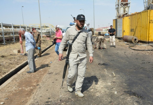 Un membre des forces de sécurité irakiennes sur les lieux d'une attaque suicide contre une centrale électrique au nord de Bagdad, le 2 septembre 2017 © Mahmud SALEH AFP