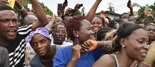 Les Liberiens apprecient de pouvoir a nouveau aller aux urnes. Ici, des supporters de George Weah, ex-star du ballon rond et candidat a la presidentielle.