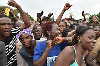 Les Libériens apprécient de pouvoir à nouveau aller aux urnes. Ici, des supporters de George Weah, ex-star du ballon rond et candidat à la présidentielle.