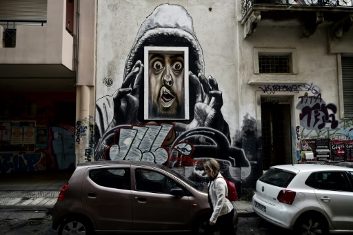 Un graffiti signé WD (Wild Drawing) sur un mur dans le centre d'Athènes, le 11 octobre 2017 © LOUISA GOULIAMAKI AFP
