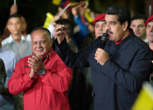 Le président vénézuélien Nicolas Maduro (d), le 15 octobre 2017 à Caracas © PRESIDENCIA PRESIDENCIA/AFP