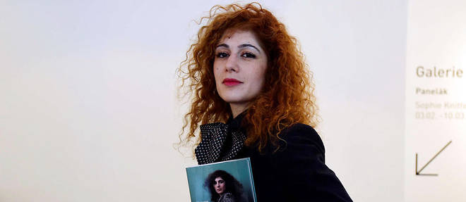 French-writing author of Iranian origin Abnousse Shalmani poses at a press conference to present Czech issue of her novel Khomeini, Sade and I, in Prague, Czech Republic, March 8, 2016. Photo/Roman Vondrous (CTK via AP Images)/vnd 1/768144869605/CZECH REPUBLIC OUT, SLOVAKIA OUT, POLAND OUT, SWEDEN OUT, NORWAY OUT Please contact your sales representative for pricing and restriction questions. CZECH REPUBLIC OUT, SLOVAKIA OUT, POLAND OUT, SWEDEN OUT, NORWAY OUT/1603081237