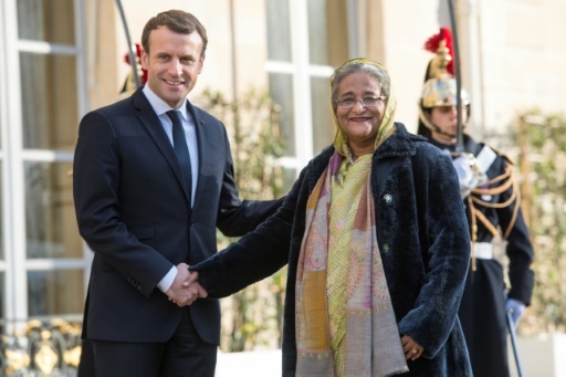 Le président français Emmanuel Macron accueille le 12 décembre 2017 à Paris la Première ministre du Bangladesh Sheikh Hasina pour un sommet sur le climat  © CHRISTOPHE ARCHAMBAULT  AFP