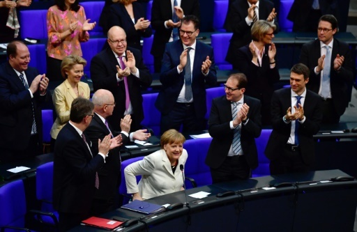 La chancelière allemande Angela Merkel est applaudie après sa réélection par le Bundestag, le 14 mars 2018 à Berlin © John MACDOUGALL AFP