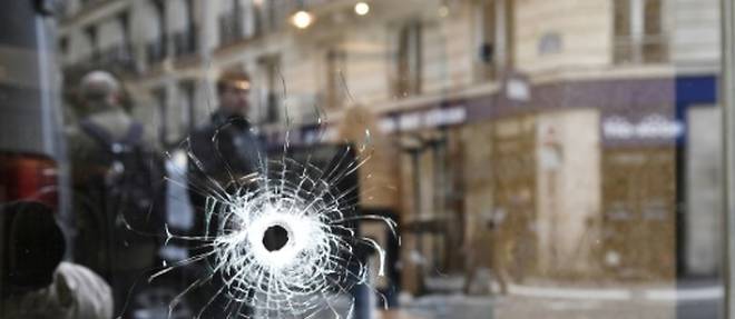"Il a dit +Allah Akbar+ tout doucement, c'etait glacant": quart d'heure de terreur au coeur de Paris