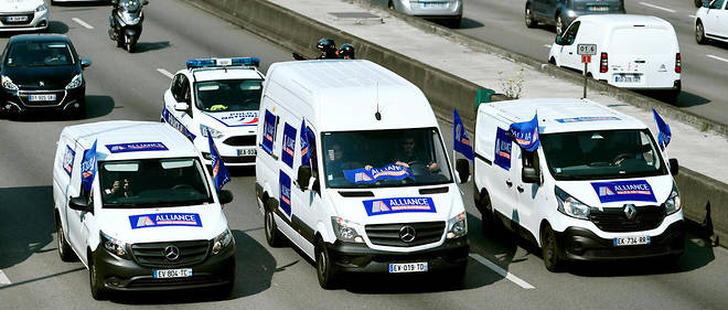 Paris : les policiers en opération escargot pour défendre leur ... Paris : les policiers en opération escargot pour défendre leur ...
