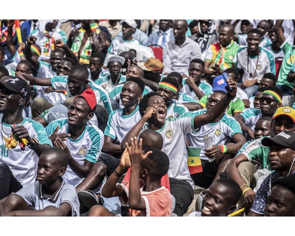 Ambiance bon enfant chez les supporters sénégalais. ©  Sylvain Cherkaoui 
