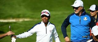  Mardi, sur le parcours du golf national. L'ex-secrétaire d'État américaine, Condoleezza Rice, marche au côté de David Ginola, lors du march des personnalités de la Ryder Cup.  
   ©FRANCK FIFE