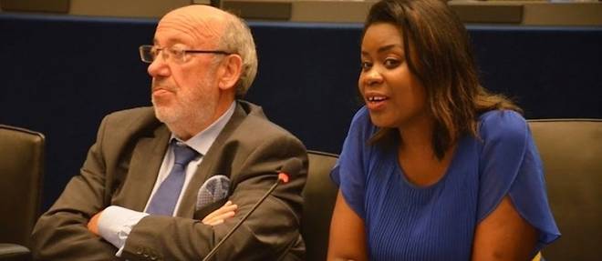 Marie-Chantal Uwitonze veut que les diasporas africaines soient prises en compte dans les solutions imaginees avec le continent. Elle est ici avec le depute europeen et homme politique belge Louis Michel.