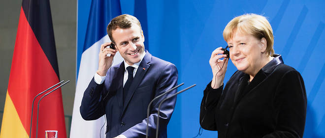 Angela Merkel et Emmanuel Macron unis mais affaiblis a Berlin. 