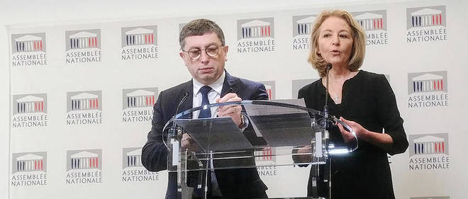 Jean-Michel Mis et Laure de La Raudiere, co-rapporteurs de la mission d'information sur la blockchain, lors de leur conference de presse a Paris le 12 decembre 2018.