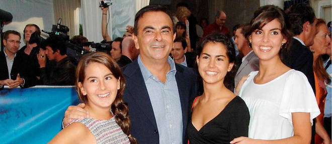 Carlos Ghosn avec ses filles a l'avant-premiere du << Diable s'habille en Prada >>, au festival du film americain de Deauville, en 2006.