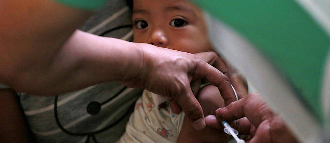 Vaccination contre la rougeole a Manille : entre le 1er janvier et le 13 fevrier 2019, plus de 4 300 cas de rougeole ont ete confirmes aux Philippines.