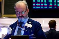 Wall Street finit en petite baisse, peu sensible &agrave; Jerome Powell