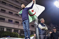  À Alger, le 11 mars au soir, après l'annonce du retrait d'Abdelaziz Bouteflika.  