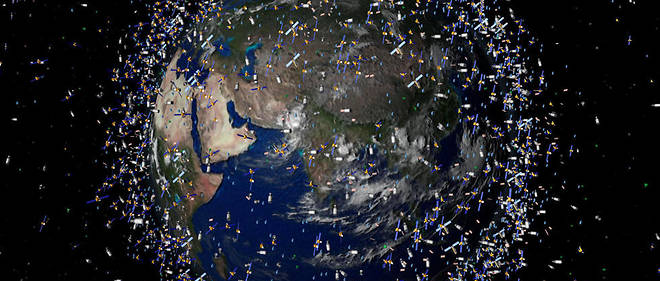 Vue d'artiste representant les debris tracables en orbite autour de la Terre, diffusee par l'Agence spatiale europeenne (ESA).  