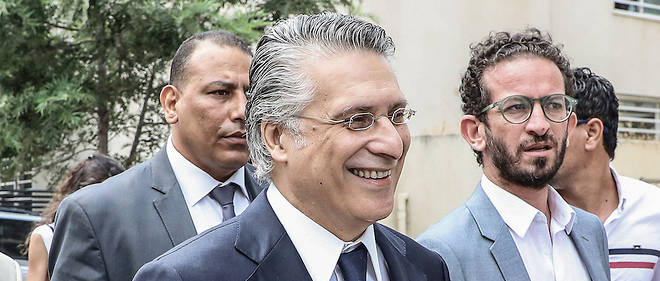 Nabil Karoui, le magnat de la communication, etait en detention preventive dans le cadre d'une enquete pour fraude fiscale, et a obtenu 15,4 % au premier tour de la presidentielle. 