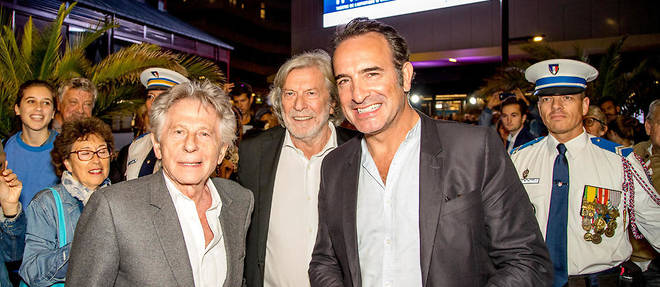 Roman Polanski et Jean Dujardin avec Daniel Benoin, organisateur du festival Cineroman a Nice.