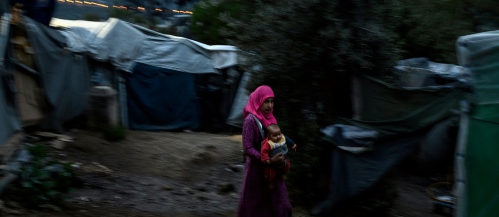 Athenes va remplacer les trois plus gros camps de migrants par des structures fermees