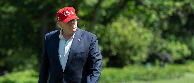 Le president americain Donald Trump de retour apres avoir joue au golf a Sterling, en Virginie, le 23 juin 2019. 
