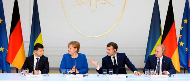 Volodymyr Zelensky, Angela Merkel, Emmanuel Macron et Vladimir Poutine ont donne une conference de presse a l'issue du sommet qui s'est tenu a l'Elysee le 10 decembre 2019.
