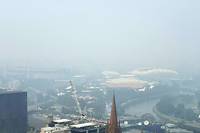 Australie: la fum&eacute;e des incendies perturbe l'Open de tennis, pluies esp&eacute;r&eacute;es