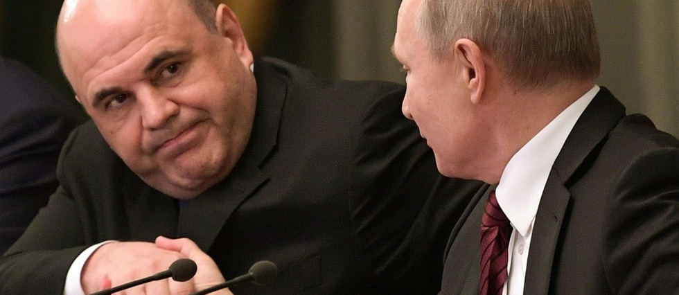 Poutine forme son nouveau gouvernement, gardant des ministres cles