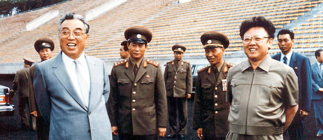 HANDOUT RESTRICTED TO EDITORIAL USE AND EDITORIAL SALES - MANDATORY CREDIT "AFP PHOTO / HO / KCNA via KNS"(FILES) This file handout picture taken on an undisclosed date in 1992 and received from North Korea's official Korean Central News Agency via the Korean News Service shows the current North Korean leader Kim Jong-Il (R) and his father and then-leader, Kim Il-Sung (L), inspecting a football ground in Pyongyang.  North Korea announced on September 21, 2010 its ruling party will hold its biggest meeting for three decades on September 28, paving the way for a likely dynastic power transfer from the ailing Kim Jong-Il to his youngest son, Kim Jong-Un. It will be the first major gathering of the Workers' Party of Korea since a congress in 1980 confirmed Kim as successor to his own father and founding president Kim Il-Sung, who died in 1994.          AFP PHOTO / FILES / KCNA VIA KOREA NEWS SERVICE / HO (Photo by KNS / KNCA / AFP), HANDOUT RESTRICTED TO EDITORIAL USE AND EDITORIAL SALES - MANDATORY CREDIT "AFP PHOTO / HO / KCNA via KNS"(FILES) This file handout picture taken on an undisclosed date in 1992 and received from North Korea's official Korean Central News Agency via the Korean News Service shows the current North Korean leader Kim Jong-Il (R) and his father and then-leader, Kim Il-Sung (L), inspecting a football ground in Pyongyang. North Korea announced on September 21, 2010 its ruling party will hold its biggest meeting for three decades on September 28, paving the way for a likely dynastic power transfer from the ailing Kim Jong-Il to his youngest son, Kim Jong-Un. It will be the first major gathering of the Workers' Party of Korea since a congress in 1980 confirmed Kim as successor to his own father and founding president Kim Il-Sung, who died in 1994. AFP PHOTO / FILES / KCNA VIA KOREA NEWS SERVICE / HO (Photo by KNS / KNCA / AFP)
