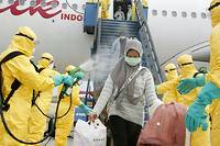 Virus: plus de 300 morts, la Chine de plus en plus isol&eacute;e