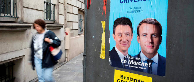 Affiche de Benjamin Griveaux en compagnie d'Emmanuel Macron lors des legislatives.
