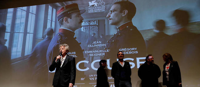 L'equipe du film "J'accuse", dont Roman Polanski, Jean Dujardin, Emmanuelle Seigner et Louis Garrel, lors d'une avant-premiere.
