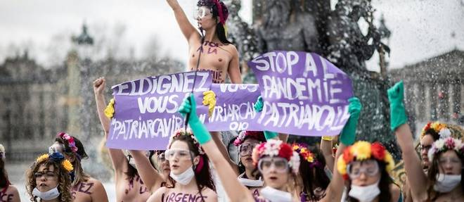 Droits des femmes: action des Femen pour "nettoyer Paris du virus patriarcal"