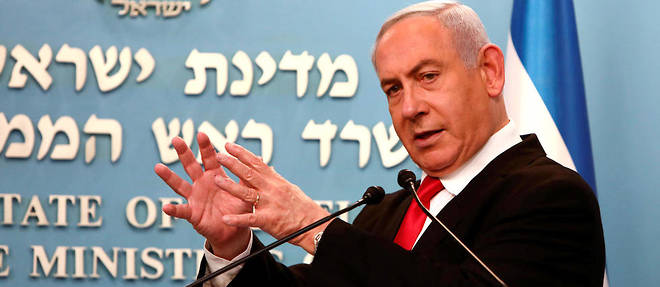 Le Premier ministre par interim, Benyamin Netanyahou, prononce un discours sur les mesures prises contre le coronavirus, dans son bureau de Jerusalem, le 14 mars 2020.
