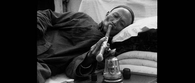 Fumeur d'opium a Saigon.
