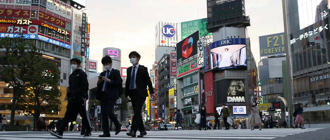 La celebre quartier Shibuya de Tokyo est moins frequente depuis le debut de l'epidemie de coronavirus.
