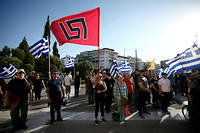 Des partisans du parti d'extrême droite grec Aube dorée, en 2018
