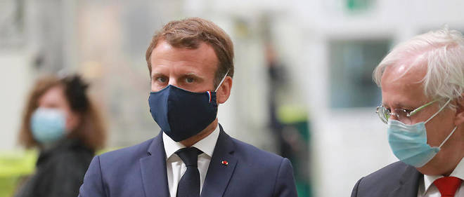 Emmanuel Macron lors de sa visite de l'usine Valeo d'Etaples, dans le Pas-de-Calais, le 26 mai. 
