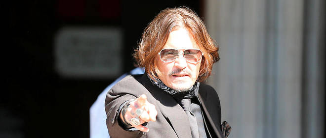Johnny Depp a son arrivee au tribunal, a Londres le 22 juillet. 
