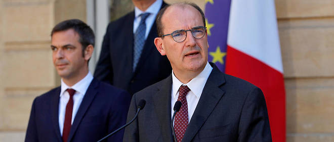 Le Premier ministre, Jean Castex (a dr.), et le ministre de la Sante, Olivier Veran, le 13 juillet, a Paris. 
