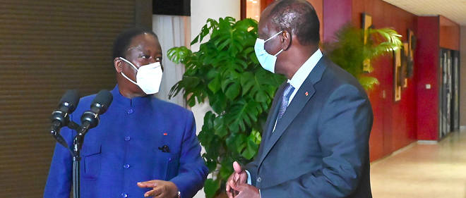Alassane Ouattara et Henri Konan Bedie, l'actuel et l'ex-president de Cote d'Ivoire, ont de concert << brise la glace >>.

