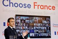Macron promet aux patrons &eacute;trangers de continuer &agrave; r&eacute;former