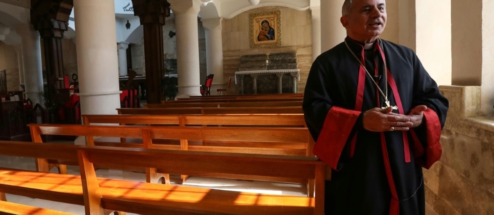 Dans les stigmates de la guerre, l'archeveque de Mossoul attend des "mots forts" du pape