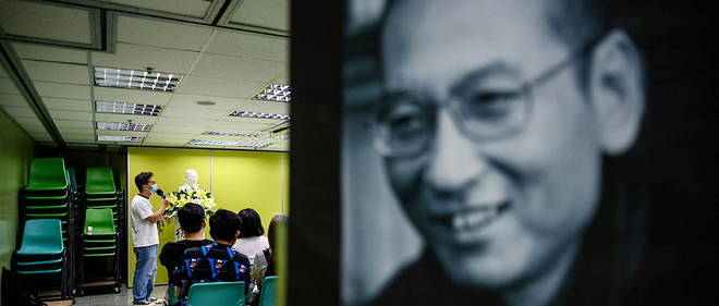 Militants celebrant en juillet 2020 le 3e anniversaire de la mort du dissident chinois et Prix Nobel de la paix 2010 Liu Xiaobo.
